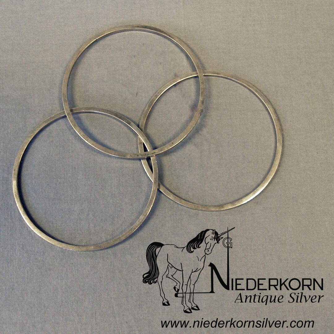 Three Sterling Silver Bangles by Allan Adler