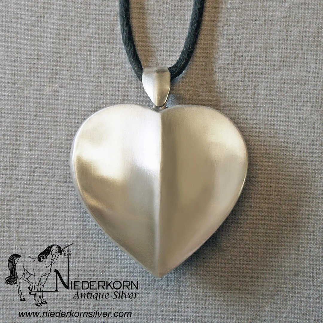 Product 1Sterling Silver Heart Pendant on Satin Cord